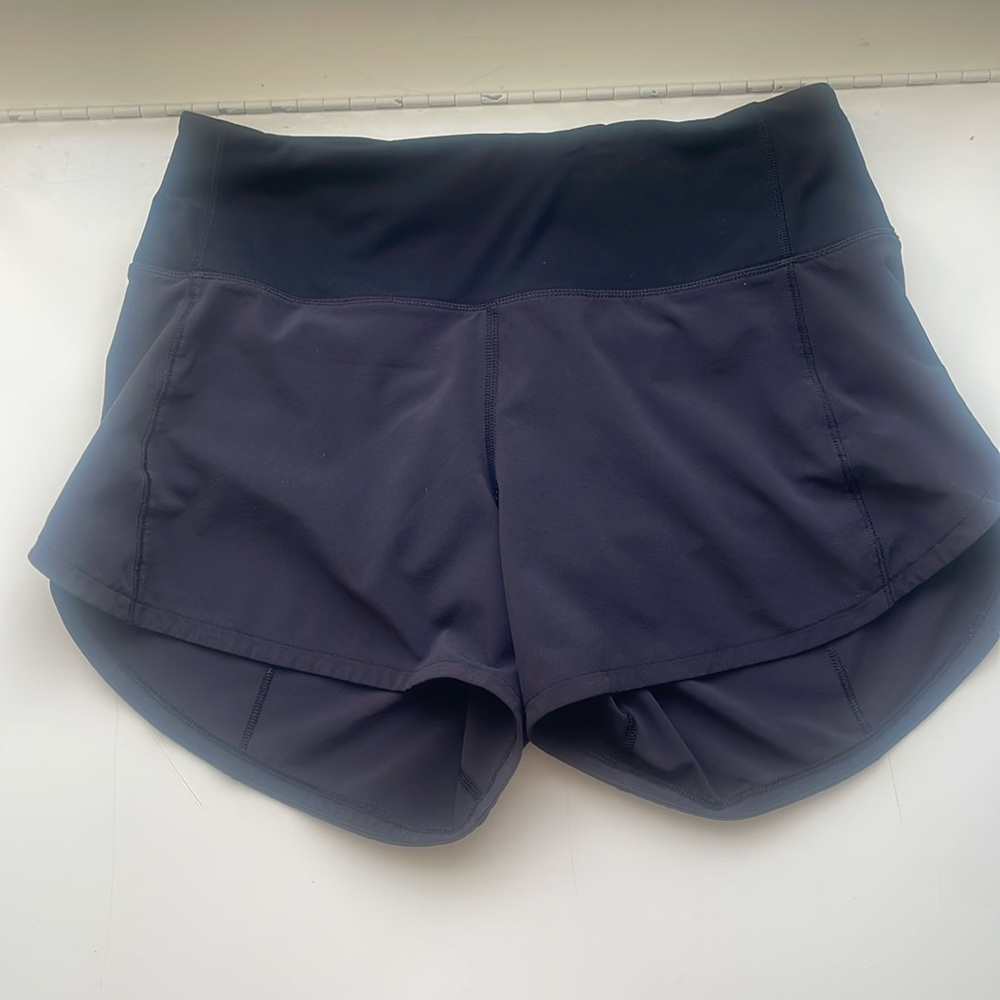 size 4 length 4 inch Lululemon black speed ups.